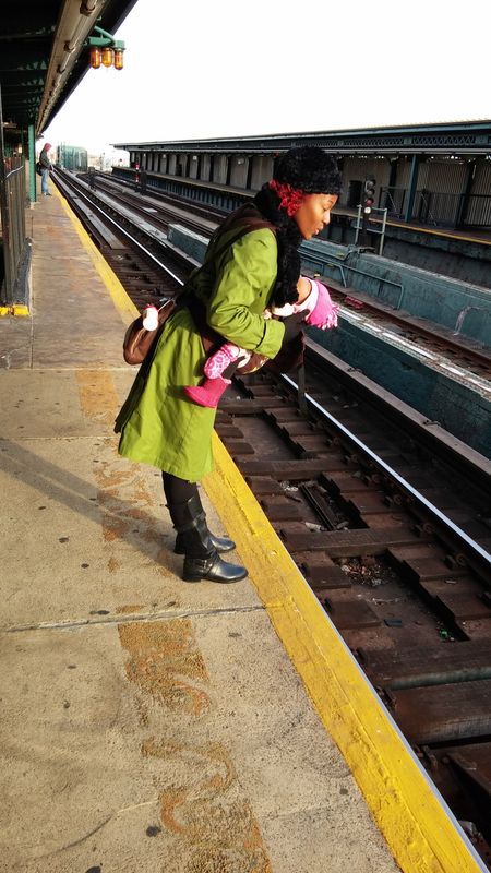babywearing-looking-trainrails-NY